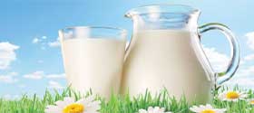 pitcher and glass of milk